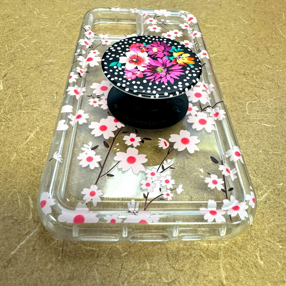 iPhone 12 Pro with pop socket.